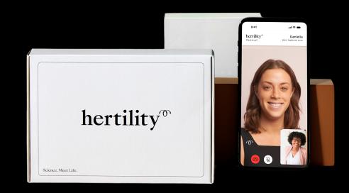 A clinician video call with a hertility test next to the phone